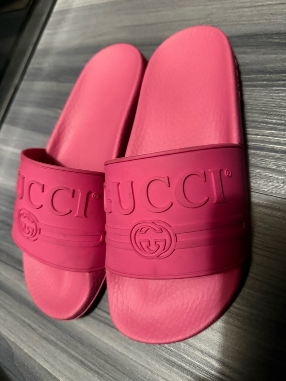 Gucci Pink Embossed Logo Slide Sandals